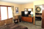 Mammoth Lakes Rental Woodlands 48 - Master Bedroom with Flat Screen TV and Large Closet